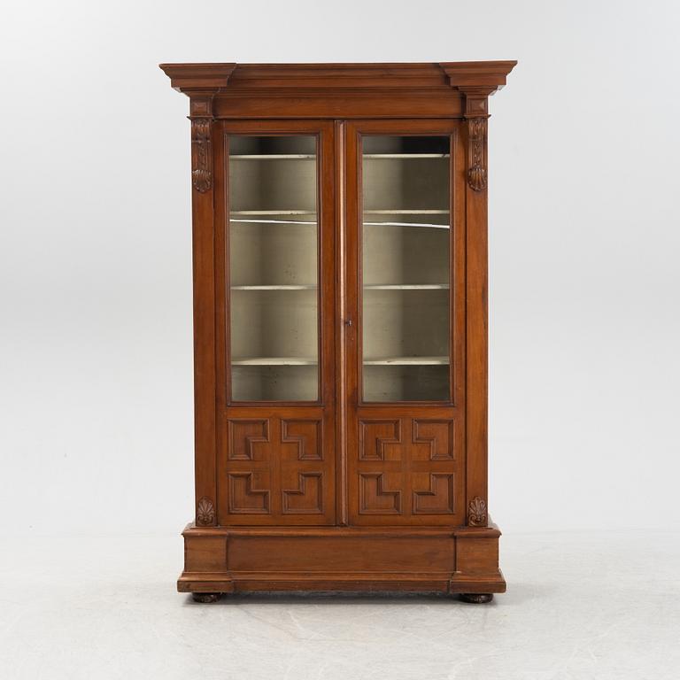 A mahogany veneered cabinet, circa 1900.