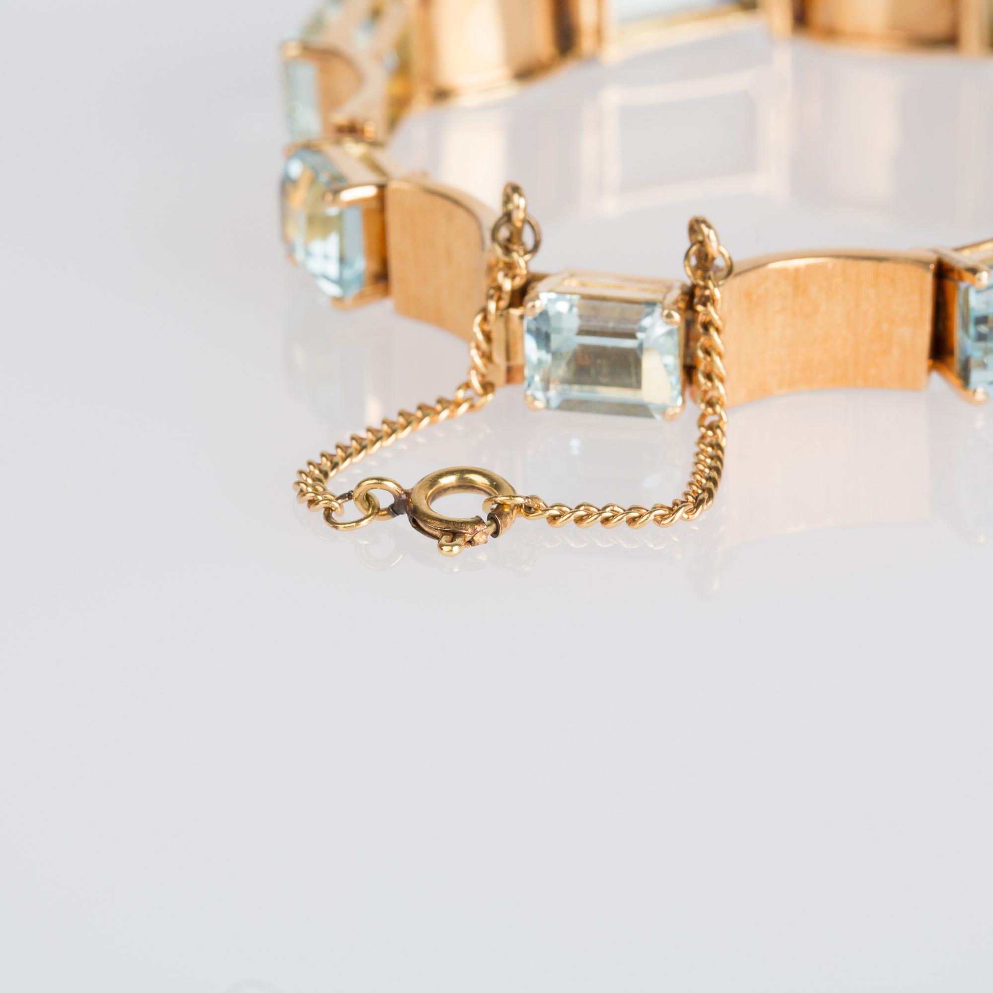 ARMBAND, 14 K guld med trappslipade akvamariner.