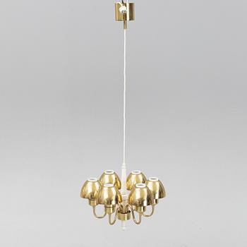 Hans-Agne Jakobsson, a 'T526' brass and wood ceiling light from Markaryd.