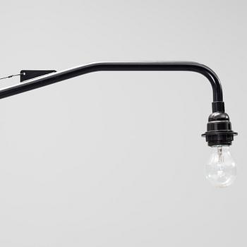 a JEAN PROUVÉ "Potence" wall light designed in 1950, ansorg for Vitra.