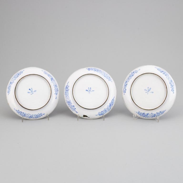 Three enamel on copper dishes, Qing dynasty, 19th century.