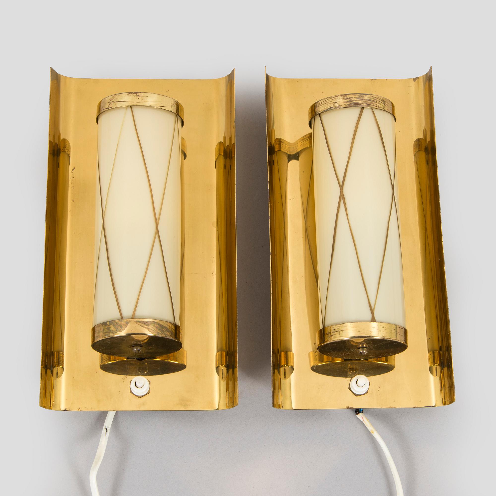 A pair of mid 20th century wall lights for Aris, Arisuo, Finland.