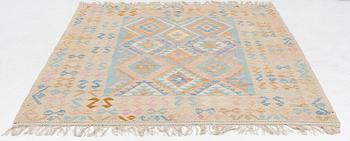 A Kelim carpet, c. 252 x 200 cm.