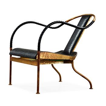 36. A Mats Theselius 'El Rey' brass and leather easy chair, Källemo, Sweden.