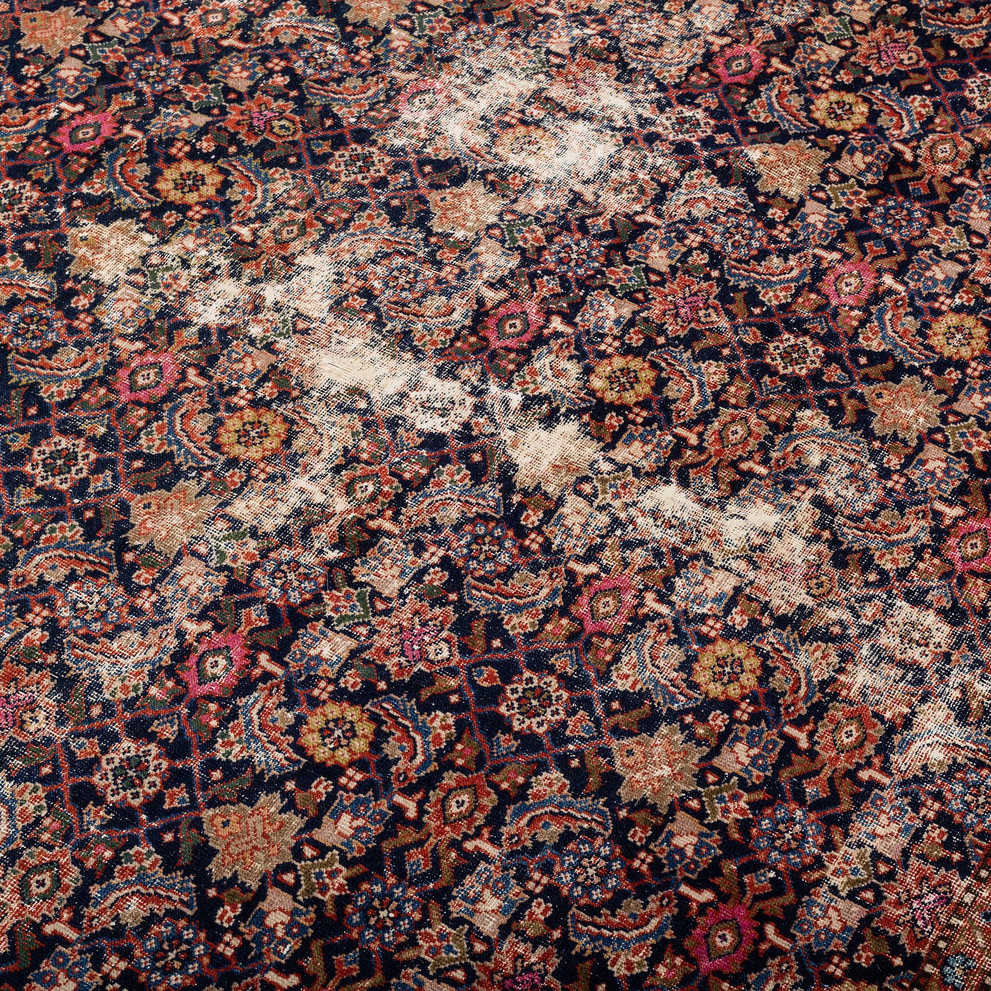 A CARPET, Antique West persian, ca 356,5  x 303,5 cm.