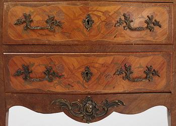 A Louis XV-style marquetry commode, first part of the 20th century.