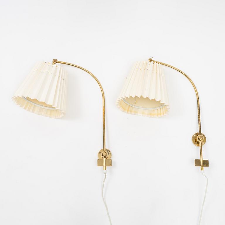 Josef Frank, a pair of model 2600 wall mounted lamps, Firma Svenskt Tenn.