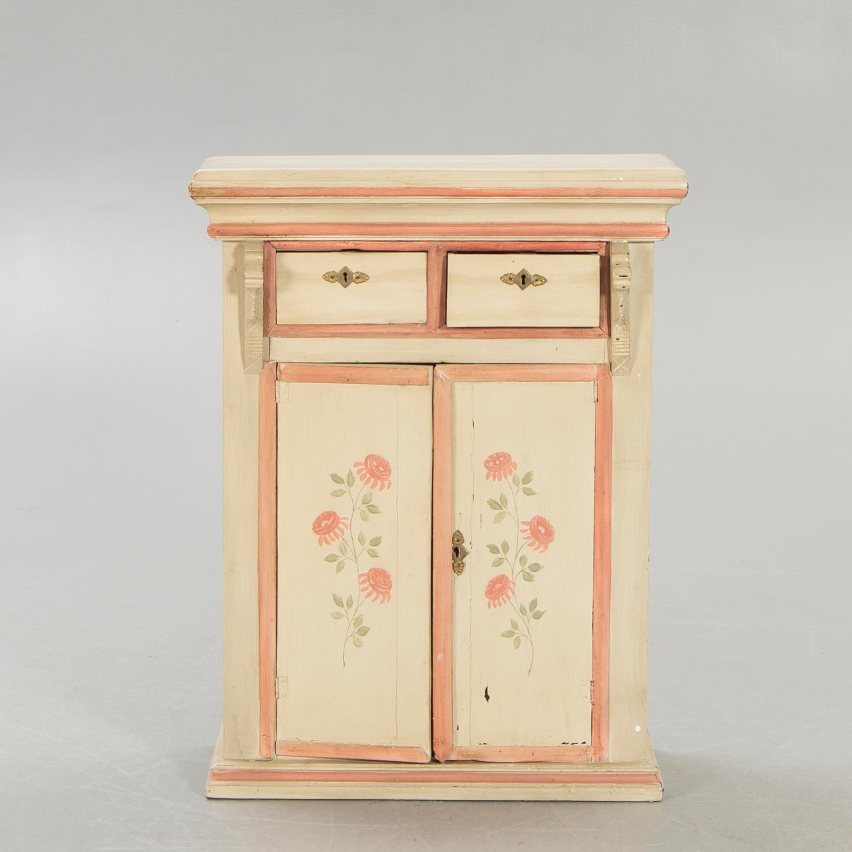 An 18th century painted cabinet.