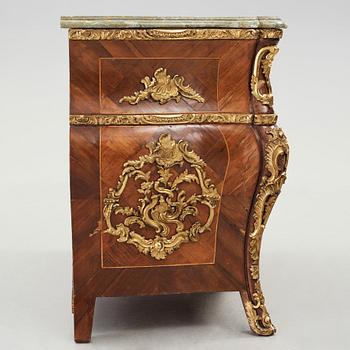 A Swedish Rococo chest of drawers by Christian Linning dated 1761 (master in Stockholm 1744-1779).