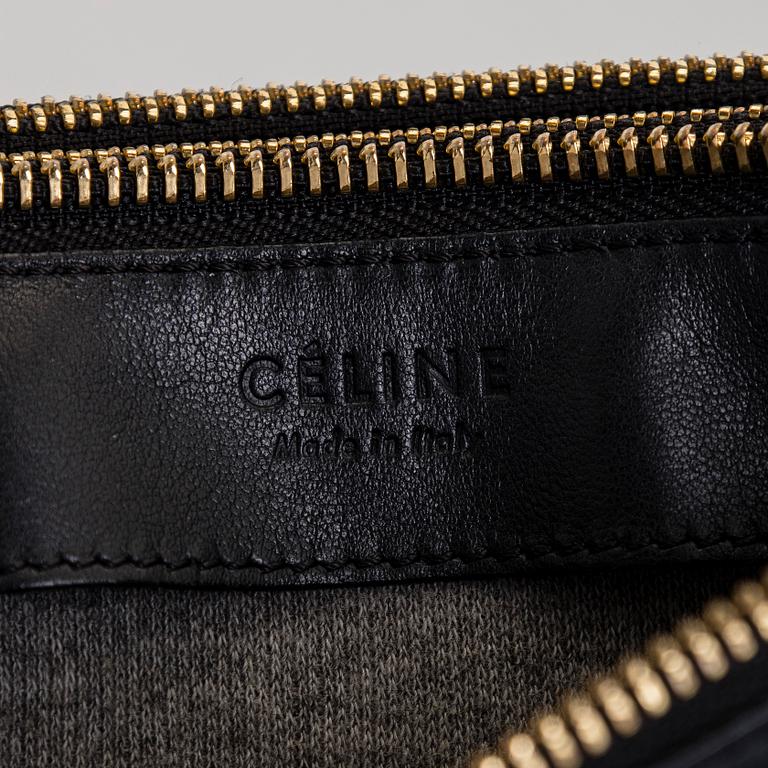 Céline, a black leather 'Trio Small' bag.
