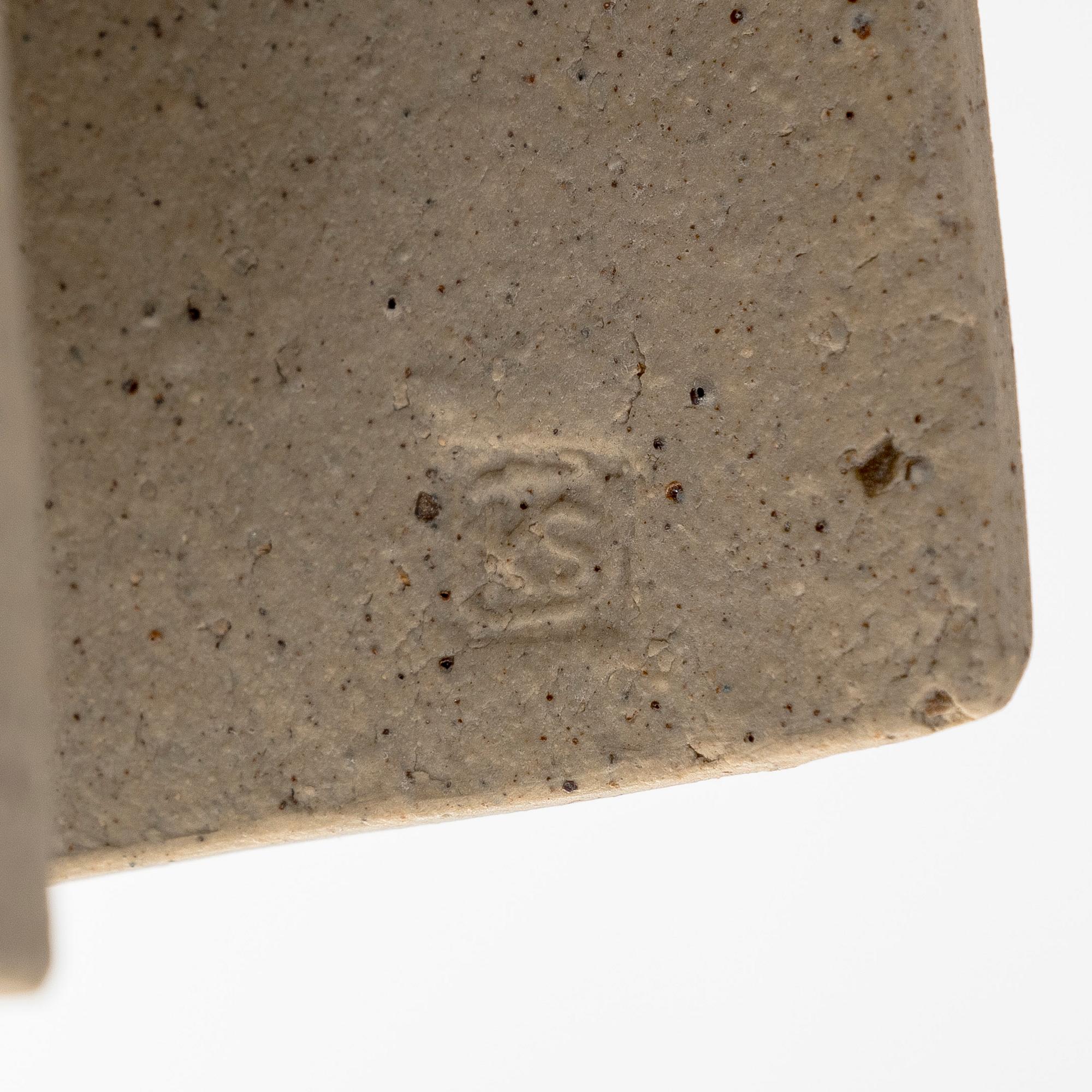 Kyllikki Salmenhaara, a 'Winding' stoneware sculpture, signed KS.