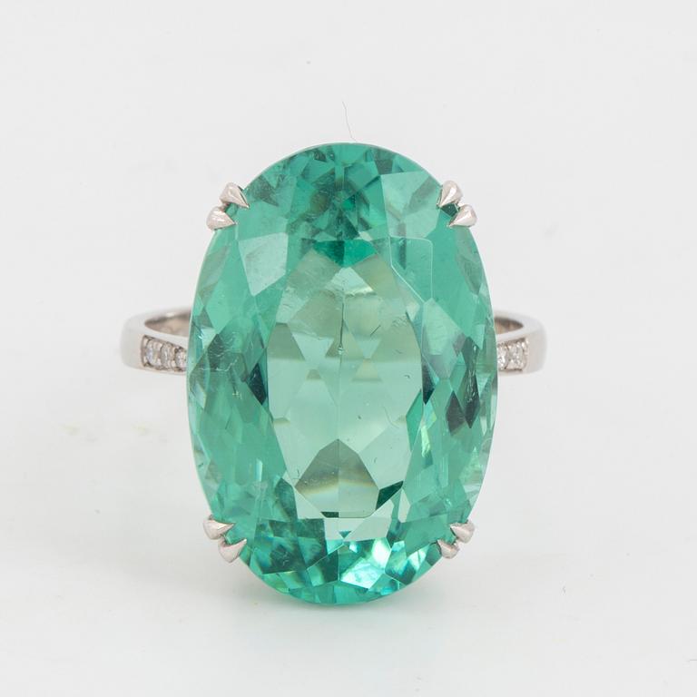 Large greenblue oval faceted tourmaline  cocktail ring.