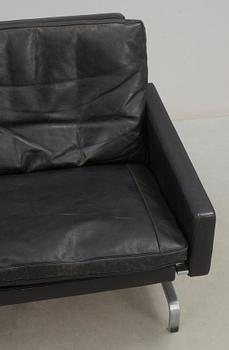 A Poul Kjaerholm 'PK-31-2' black leather and steel sofa, E Kold Christensen, Denmark.