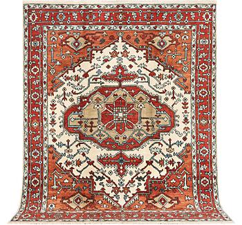 An oriental carpet, c. 296 x 238 cm.