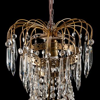 KRISTALLKRONA, empirstil, 1900-talets mitt. Höjd inkl. ked 95 cm.