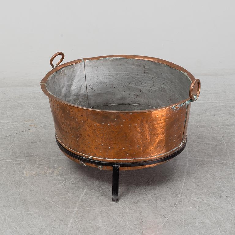 A copper pot, 19th Century.