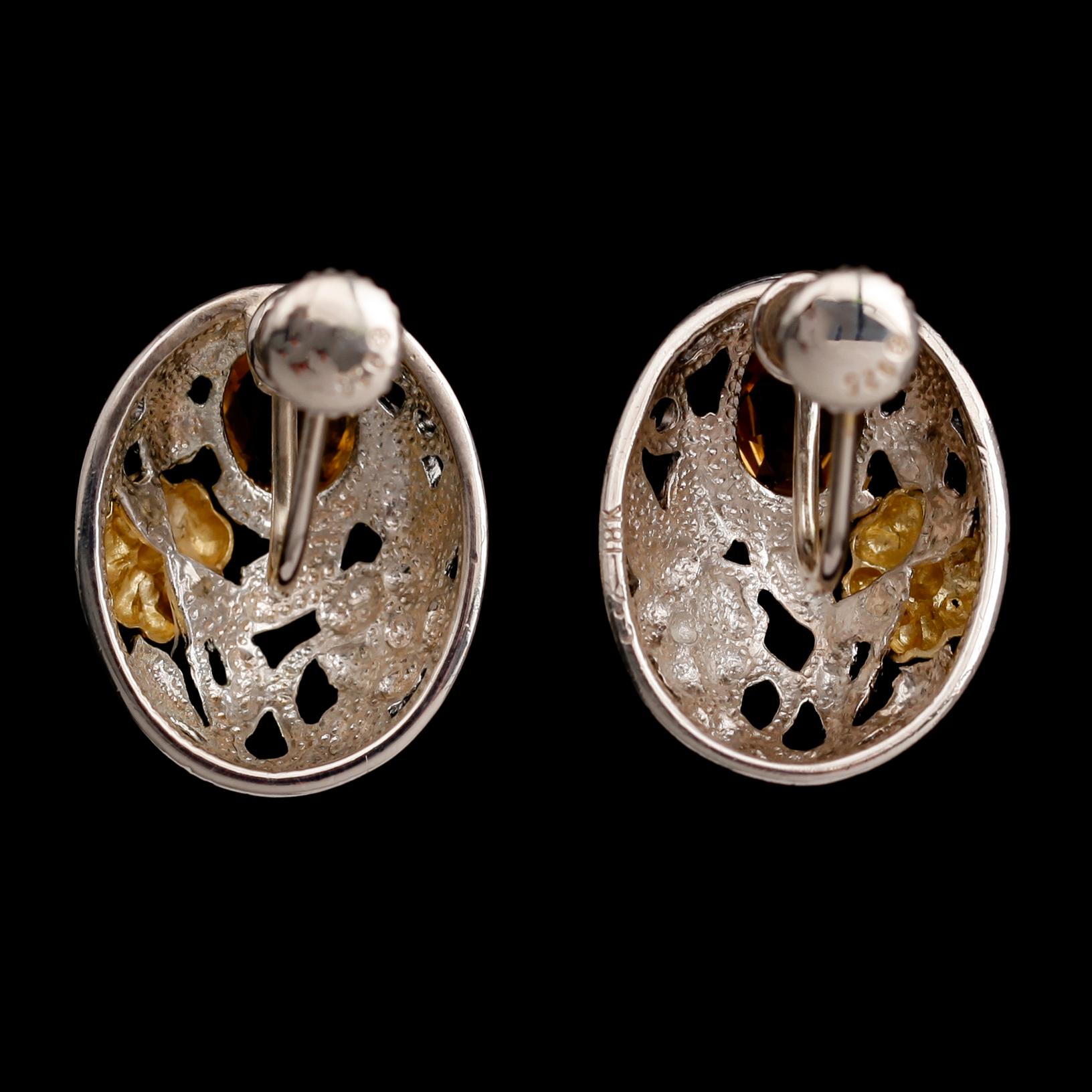 ÖRHÄNGEN, 1 par, 18 k vitguld, sterlingsilver, citriner tot ca 2.50 ct.