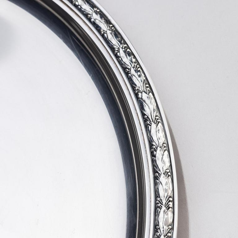 A Swedish silver dish and two silver coasters, marks of W.A. Bolin, Stockholm 1957.