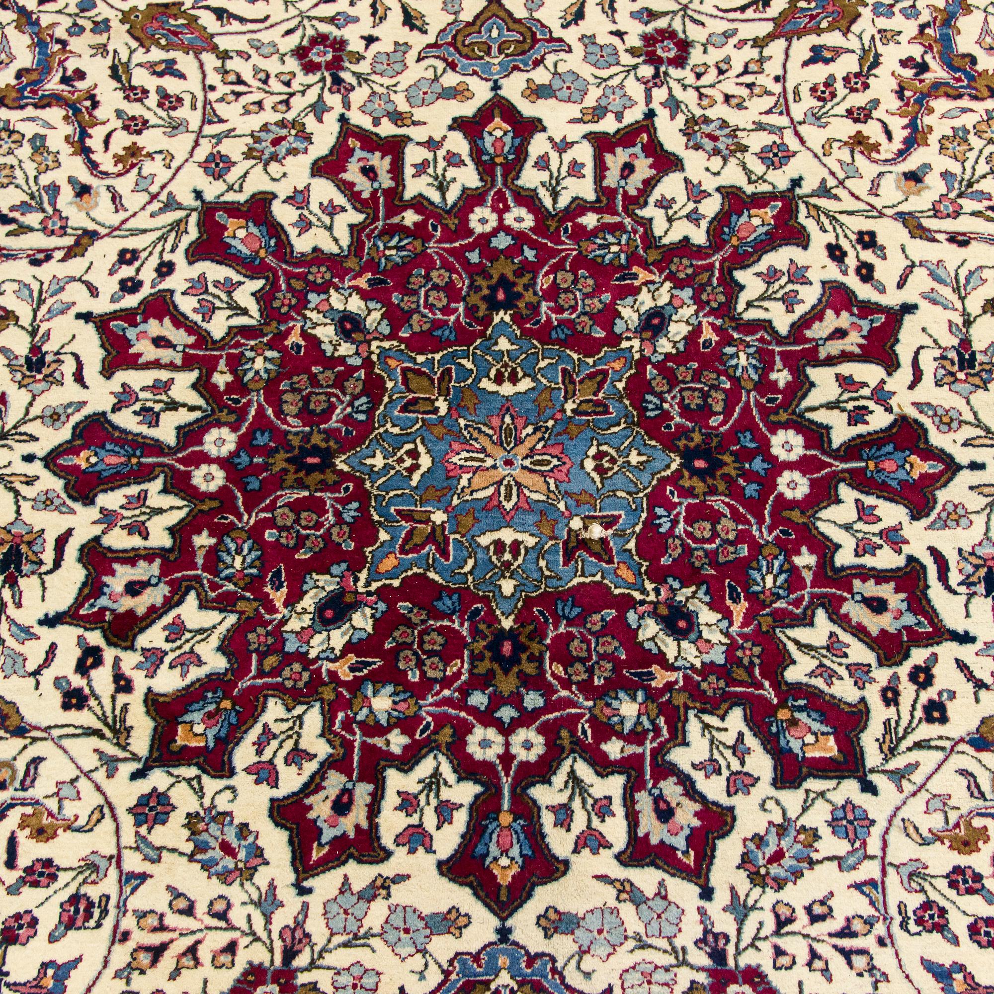 A Meshed rug, old, 380 x 300 cm.