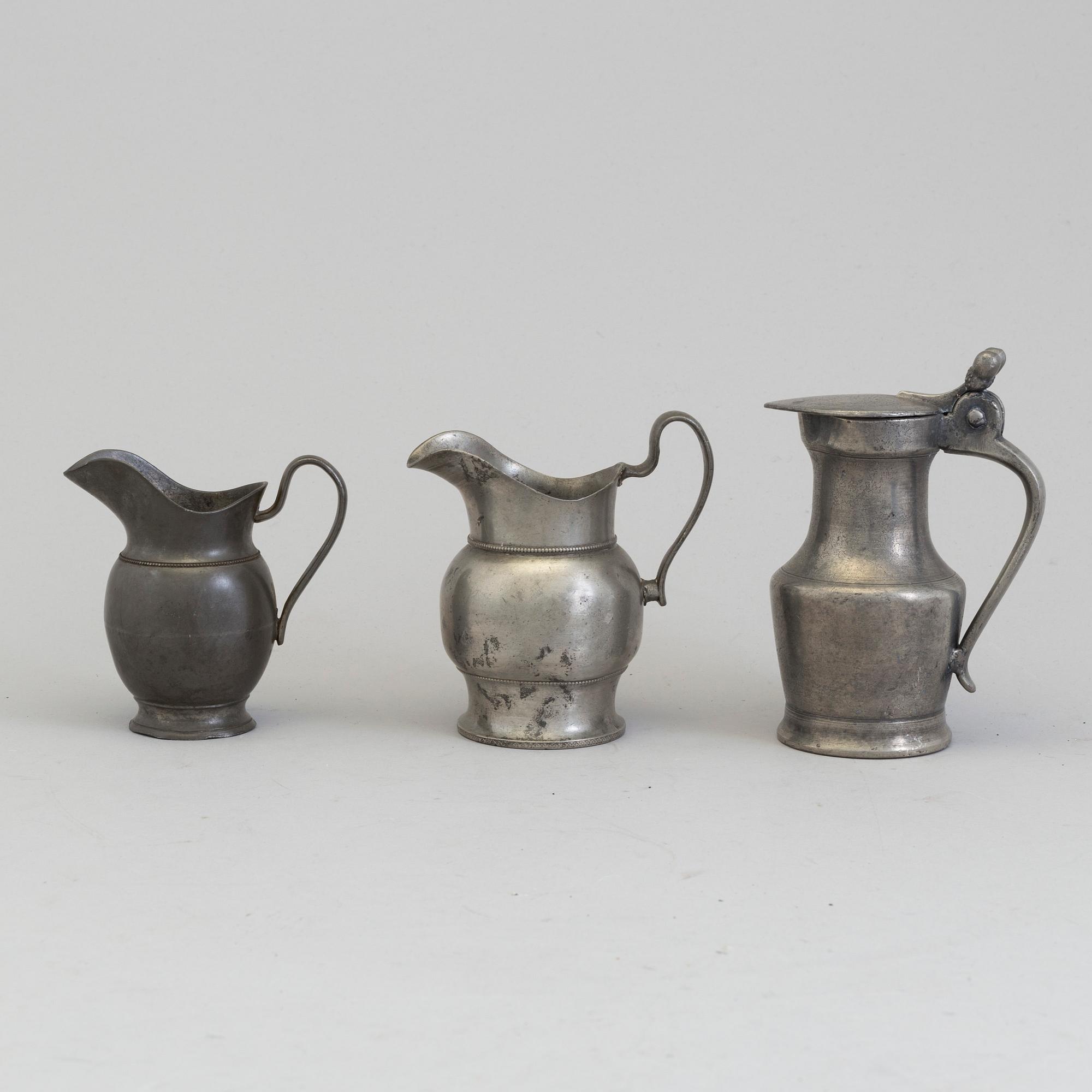 THREE PEWTER JUGS, 18th/19th century.