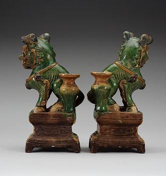 A pair of seated Buddhist lions, 17th Century.