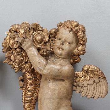 A pair of German Baroque circa 1700 wooden sculptures.