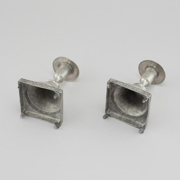 A pair of pewter candlesticks, probably by Gustaf Frederic Wigholm in Eskilstuna, first half of the 19th century.