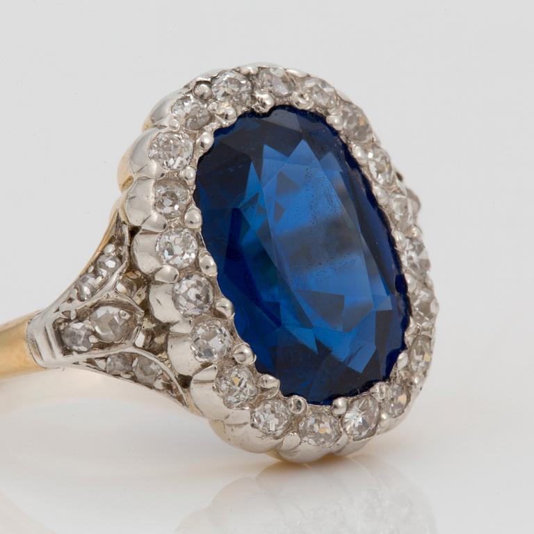 A 7.60 ct unheated sapphire and diamond cluster ring. Certoificate from SSEF.