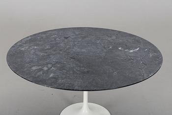 AN EERO SAARINEN "TULIP" TABLE BY KNOLL INTERNATIONAL.