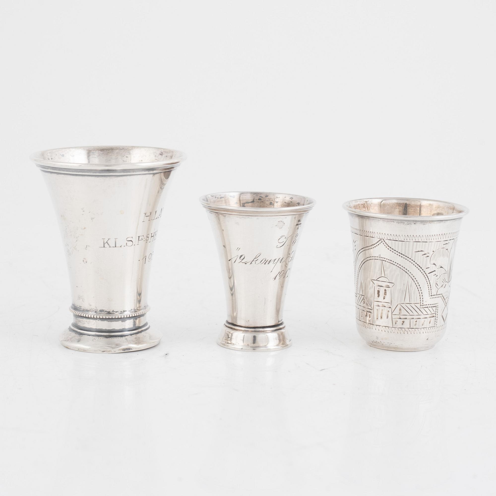 A set of five silver beakers, including MGAB, Stockholm 1946.
