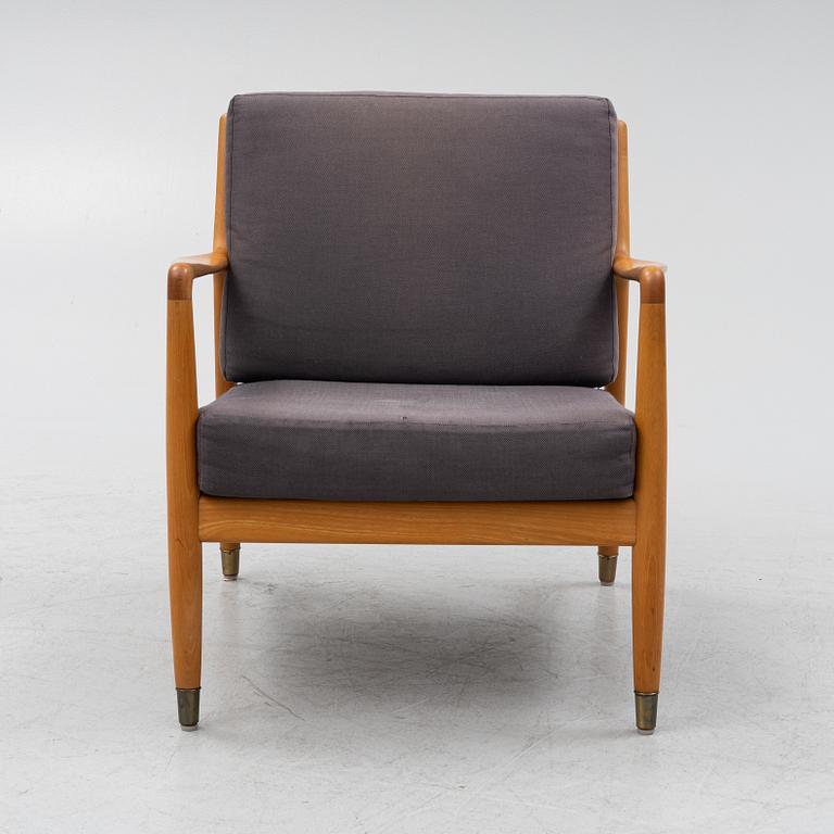 Folke Ohlsson, a beech 'USA-143' armchair, designed in 1953.