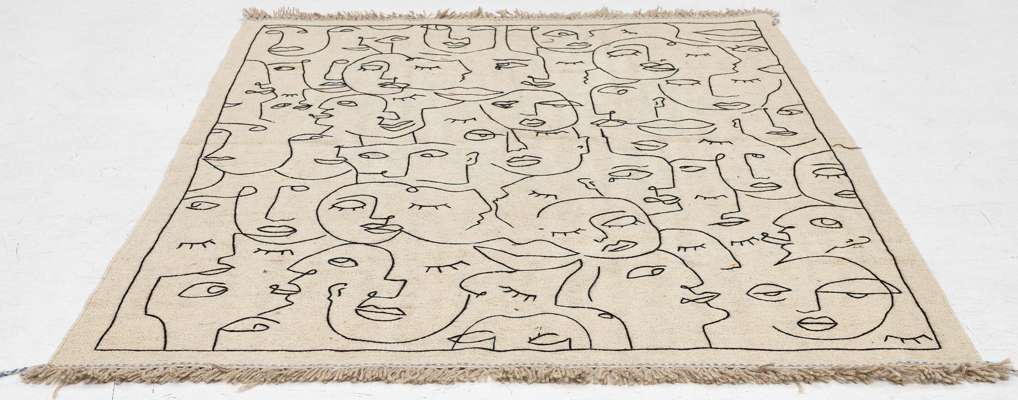 A hand-embroidered Kelim carpet, 203 x 148 cm.