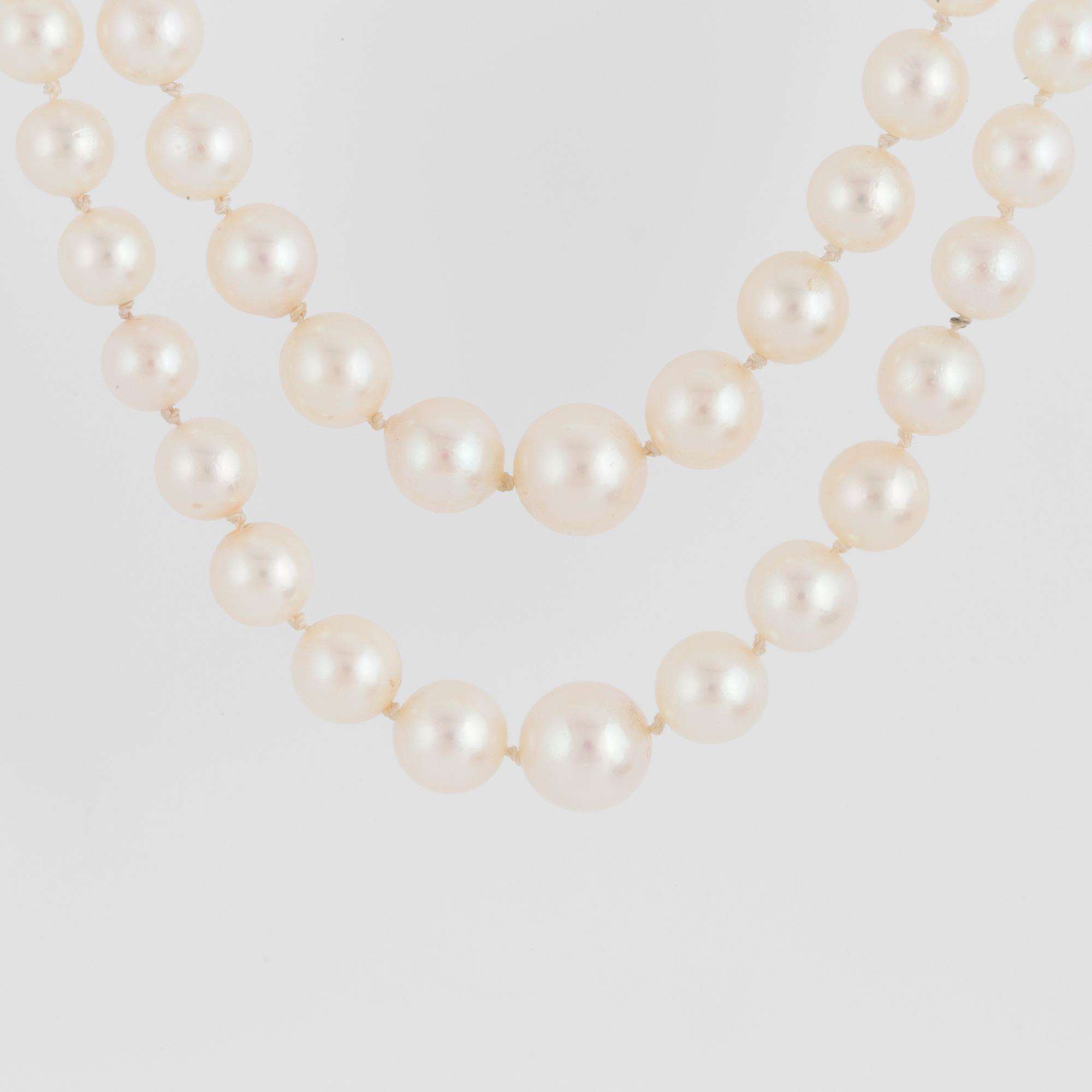 PEARL NECKLACE, silver clasp with amethyst.