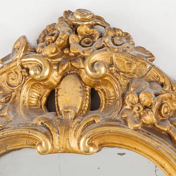 A late 19th century rococo style mirror.