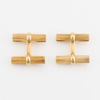 Van Cleef & Arpels, cufflinks with interchangeable parts in 18K gold and stone.