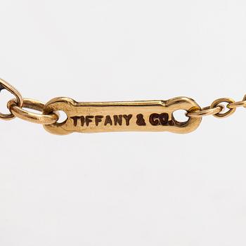 Tiffany & Co, Elsa Peretti, collier, "Diamonds by the Yard", 18K guld med en diamant ca 0.05 ct.