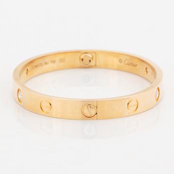 A Cartier bracelet "Love" in 18K gold set with round brilliant-cut diamonds.