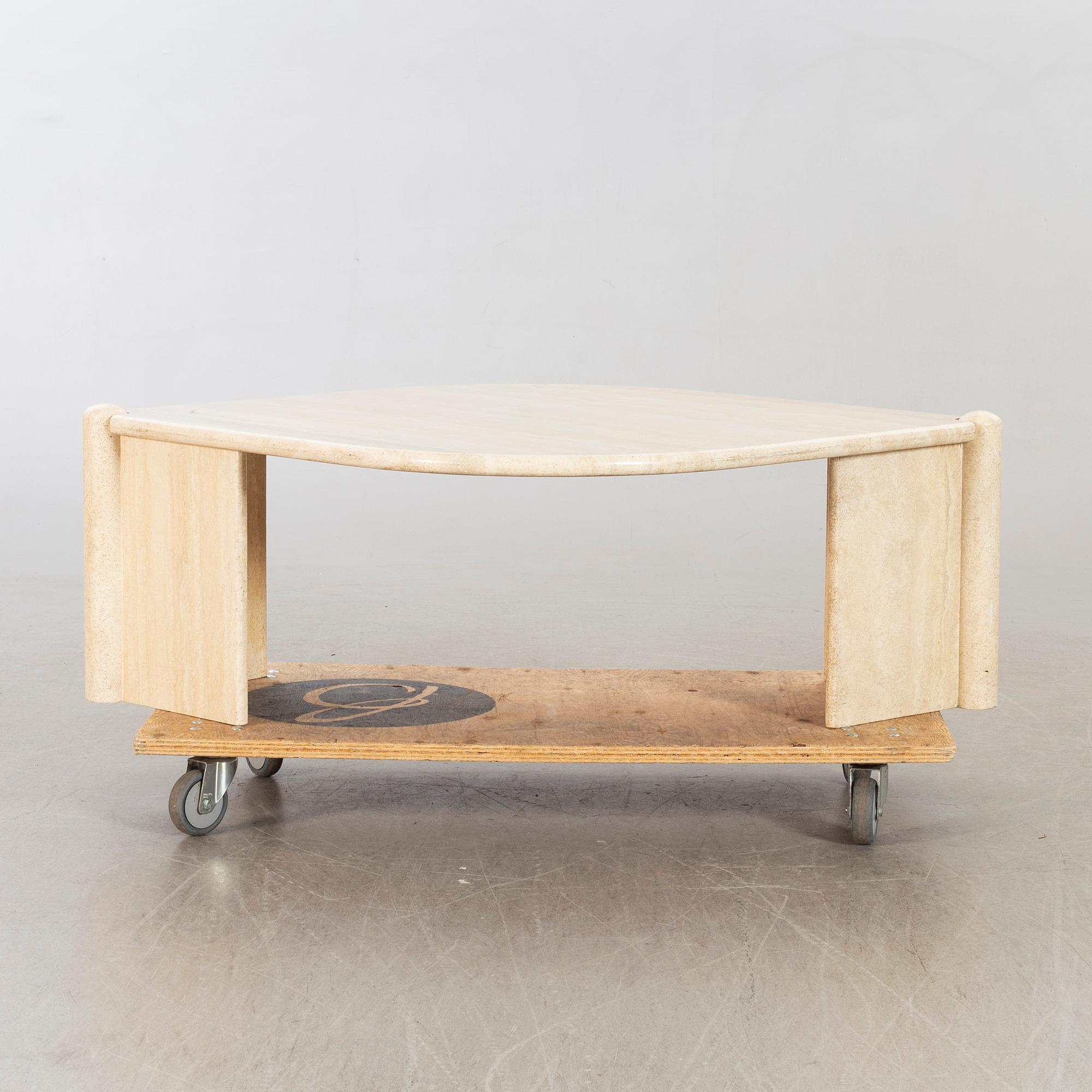 A 20th century second half travertin sofa table.