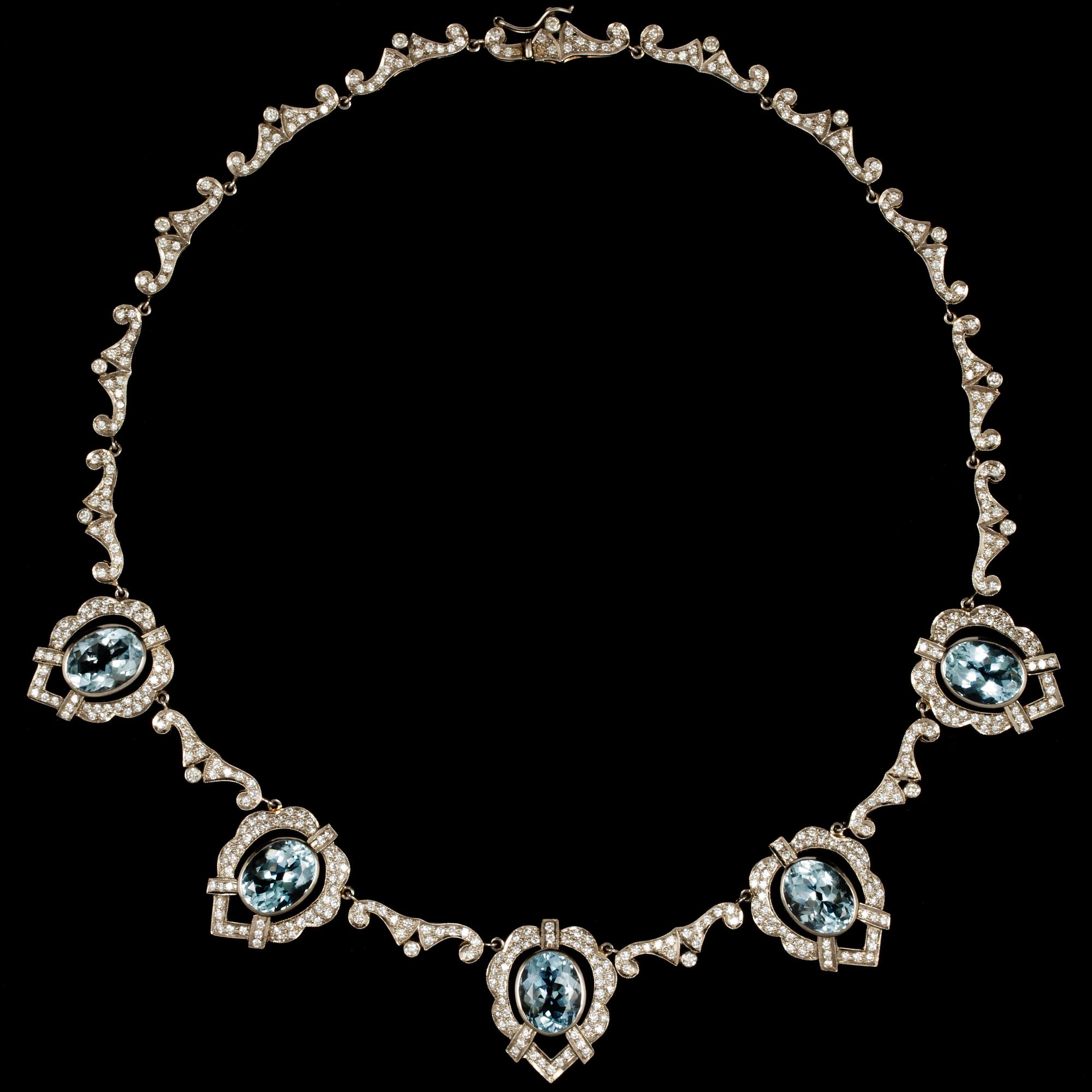 An aquamarine, tot. app. 20 cts and diamond necklace, tot. app. 5 cts.