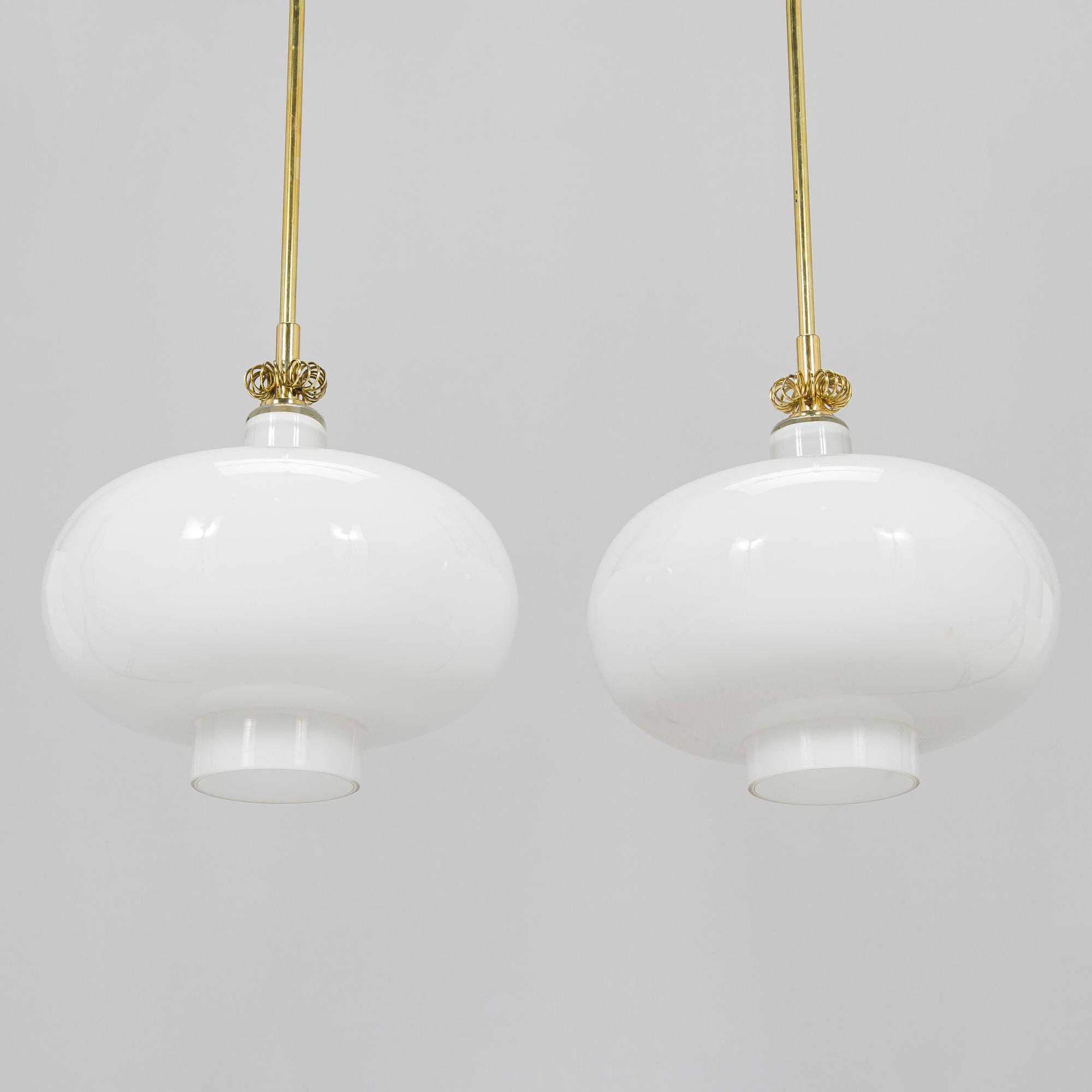 Paavo Tynell, a pair of mid-20th century 'K2-19' pendant lights for Idman.
