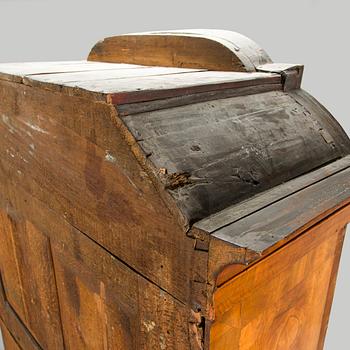 A Swedish walnut-veneered rococo cabinet in the manner of C. Linning, latter half of the 18th Century.