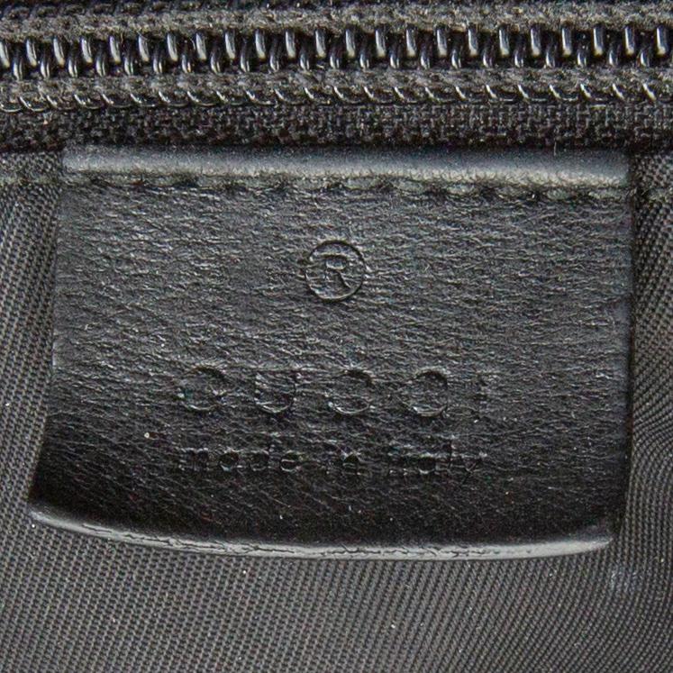 A Techno Web Stripe Canvas Tote  by Gucci.