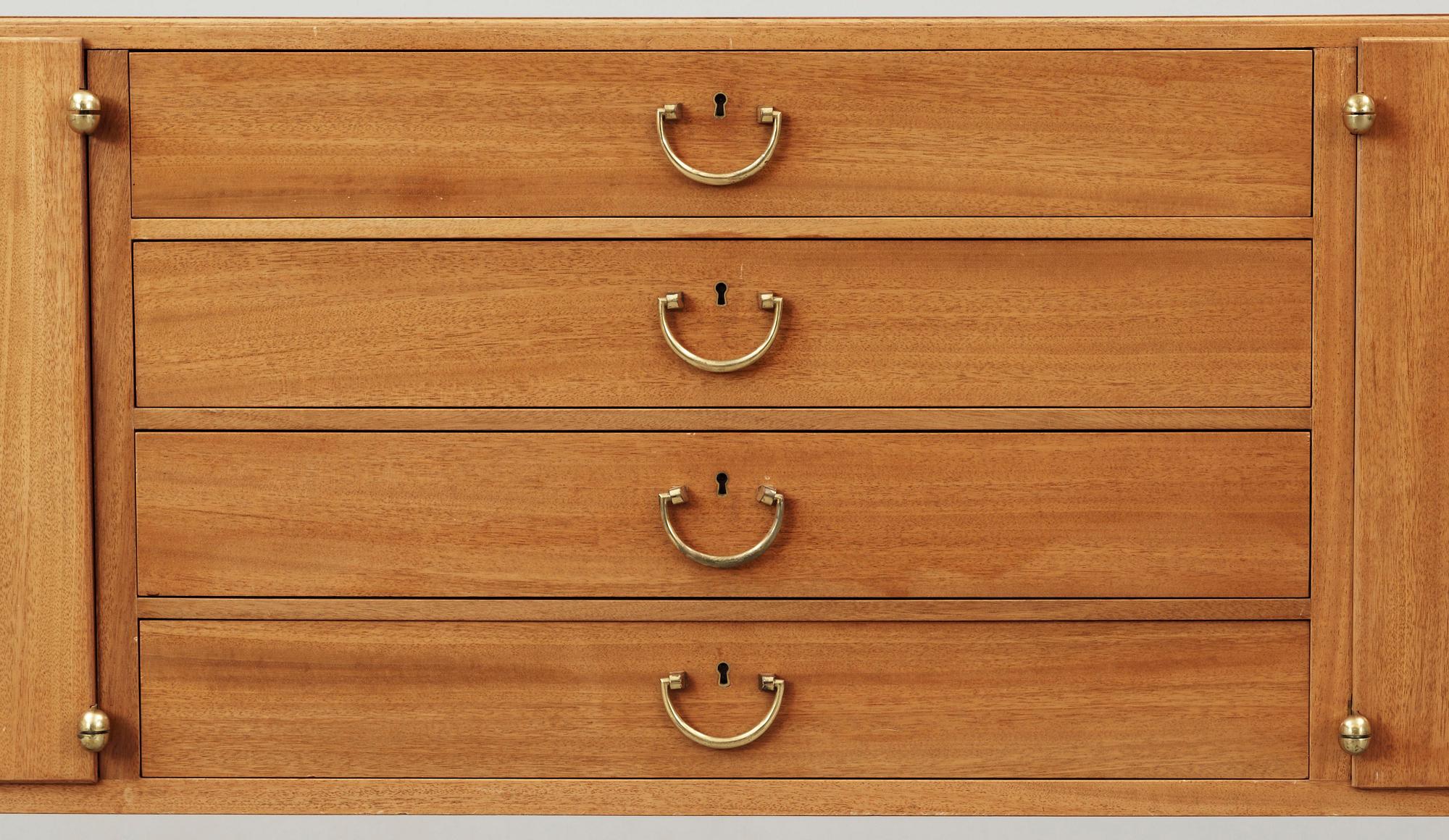 A Josef Frank mahogany sideboard by Svenskt Tenn, model 1015.