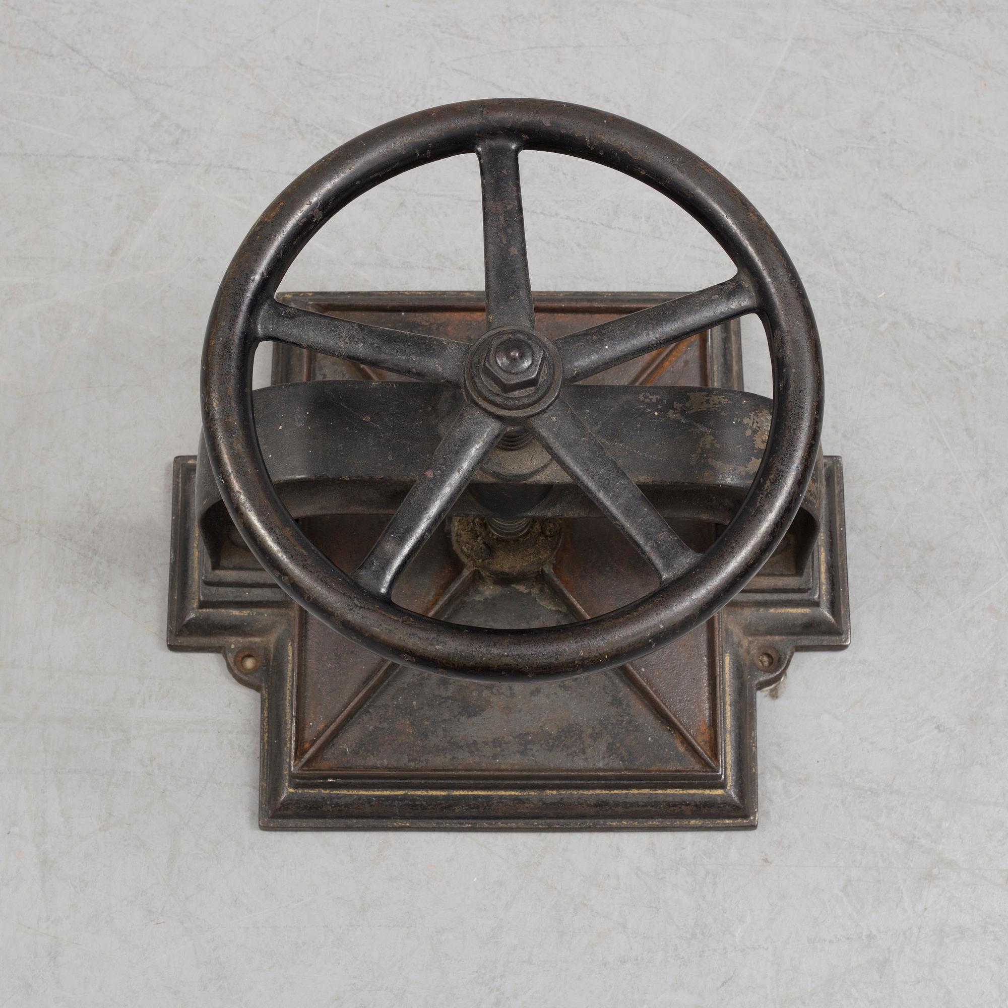 A cast iron book press from around year 1900.