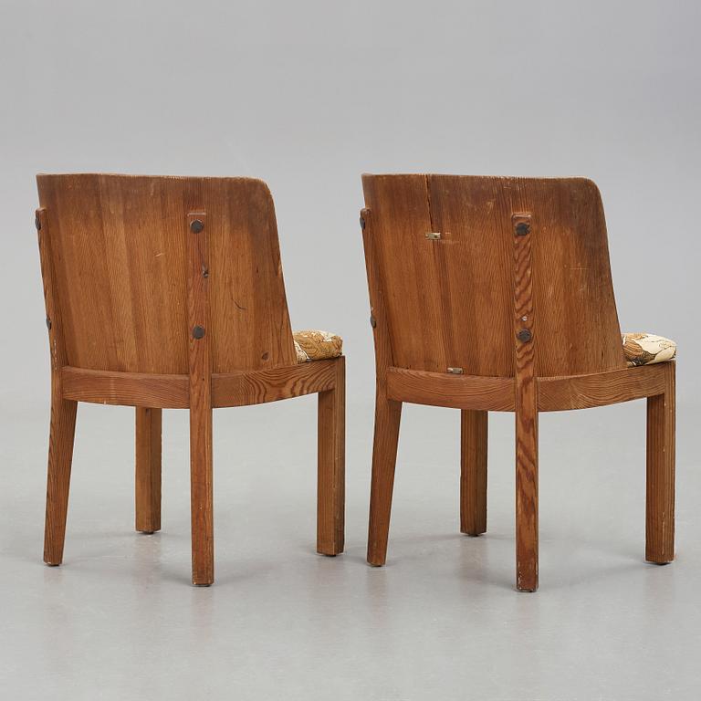 Axel Einar Hjorth, a pair of "Lovö" stained pine armchairs, Nordiska Kompaniet, Sweden 1930's.