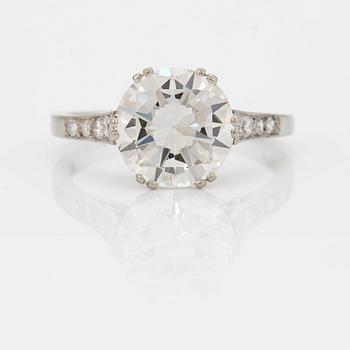 976. A SOLITAIRE RING with an old-cut diamond 2.56 cts.