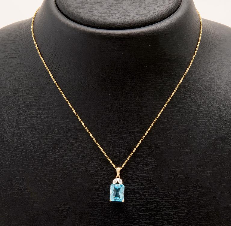 Halsband 14K guld med trappslipad blå topas och runda briljantslipade diamanter.