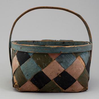 a painted basket from the 19th century.