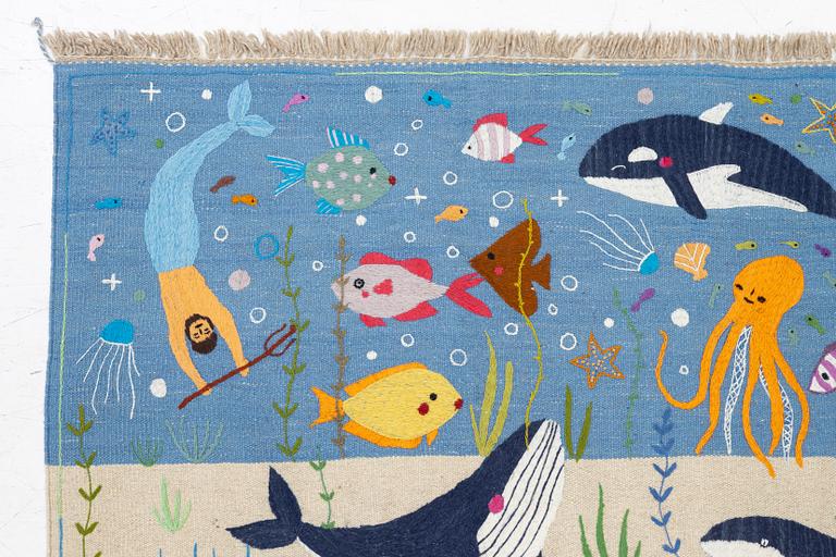 A hand-embroidered Kelim rug, 185 x 122 cm.