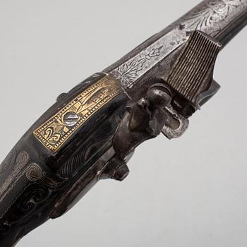 An 18th century  flintlock pistol for the oriental market.